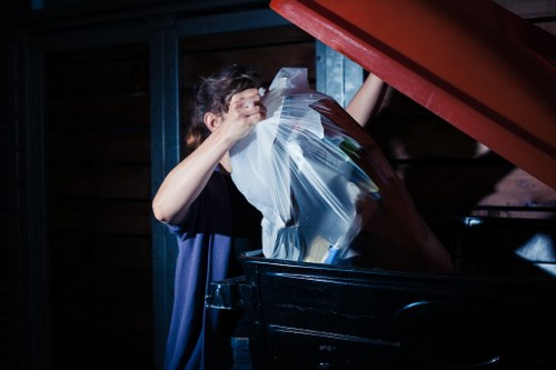 Photograph of a damaged commercial waste container awaiting assessment